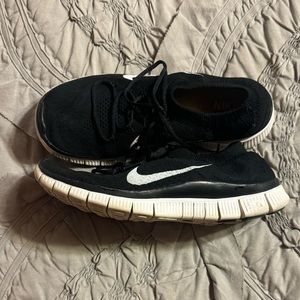Nike black knit tennis shoes size 7.